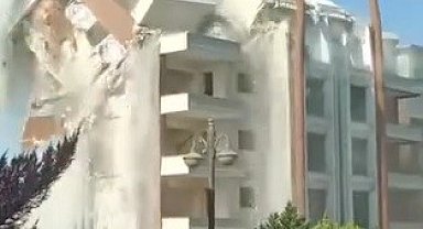 İş makinesinin darbesiyle 9 katlı bina yerle bir oldu